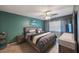 Comfortable main bedroom features an accent wall and stylish furnishings at 7700 92Nd St # 207, Seminole, FL 33777
