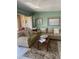 A cozy living room with comfortable couches, a coffee table, and bright green walls at 7701 Starkey Rd # 602, Seminole, FL 33777