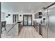 Spacious kitchen with granite island, stainless steel appliances, and outdoor access at 9208 N 27Th St, Tampa, FL 33612