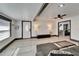 Inviting living room with hardwood floors, recessed lighting, and comfortable gray sectional sofa at 9208 N 27Th St, Tampa, FL 33612