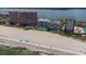 Scenic aerial view of beachfront condos with beach access and ocean views at 1350 Gulf Blvd # 301, Clearwater Beach, FL 33767