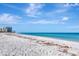 Wide sandy beach along the shore, perfect for a relaxing stroll or enjoying ocean views at 1350 Gulf Blvd # 301, Clearwater Beach, FL 33767