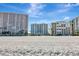 Beachfront condos along a sandy shore, offering stunning ocean views and coastal living at 1350 Gulf Blvd # 301, Clearwater Beach, FL 33767