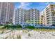 Beachfront condo with multiple balconies offering panoramic ocean views from the beach at 1350 Gulf Blvd # 301, Clearwater Beach, FL 33767