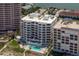 Luxury beachfront condominium complex with private balconies, pool and lush landscaping at 1350 Gulf Blvd # 301, Clearwater Beach, FL 33767
