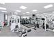 Well-equipped fitness center with modern machines, mirrors and bright lights for a complete workout experience at 1350 Gulf Blvd # 301, Clearwater Beach, FL 33767