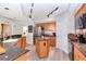 Kitchen boasts an island, stainless steel appliances and wood cabinets at 1350 Gulf Blvd # 301, Clearwater Beach, FL 33767