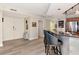 Kitchen features an eat-in bar, stainless steel appliances, and sleek countertops at 1350 Gulf Blvd # 301, Clearwater Beach, FL 33767