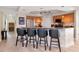 Eat-in kitchen featuring granite counters, stainless steel appliances and counter seating at 1350 Gulf Blvd # 301, Clearwater Beach, FL 33767