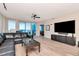 Living room with ocean view, balcony, and modern furnishings at 1350 Gulf Blvd # 301, Clearwater Beach, FL 33767