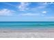 Calm ocean scene with clear turquoise waters and sandy shores, perfect for swimming at 1350 Gulf Blvd # 301, Clearwater Beach, FL 33767