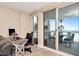 Home office featuring ocean views and balcony access at 1350 Gulf Blvd # 301, Clearwater Beach, FL 33767