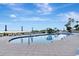 Resort-style pool with lounge chairs and beach access at 1350 Gulf Blvd # 301, Clearwater Beach, FL 33767