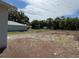 Expansive backyard featuring ample space, perimeter fencing, and storage sheds, perfect for outdoor activities at 10408 N 50Th St # 1/2, Tampa, FL 33617