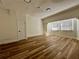 Spacious bonus room with modern floors and neutral paint at 10408 N 50Th St # 1/2, Tampa, FL 33617