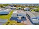 Aerial view of home featuring well-maintained gravel yard, mature landscaping, and desirable community at 109 W Saint Lucia Loop, Apollo Beach, FL 33572