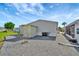 The backyard features gravel landscaping, external storage and room for outdoor living at 109 W Saint Lucia Loop, Apollo Beach, FL 33572