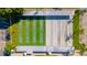 Aerial view of community shuffleboard courts showing layout and design, with parking and landscaping at 109 W Saint Lucia Loop, Apollo Beach, FL 33572