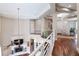 Interior view of the home showcasing the living room and a spiral staircase at 11105 5Th E St, Treasure Island, FL 33706