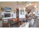Cozy living room features a fireplace, hardwood floors, and an open floor plan with lots of natural light at 11105 5Th E St, Treasure Island, FL 33706