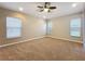 Large bedroom with multiple windows offering plenty of natural light at 11414 Weston Course Loop, Riverview, FL 33579