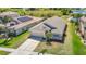 Charming single-Gathering home with a well-kept lawn, arched entryway, and neutral-toned exterior at 11414 Weston Course Loop, Riverview, FL 33579