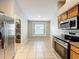 Bright kitchen with stainless steel appliances and breakfast nook at 11414 Weston Course Loop, Riverview, FL 33579