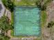 Aerial view of basketball courts, beautifully lined, and ready for some recreation in the community at 11519 Glenmont Dr, Tampa, FL 33635