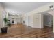 Bright kitchen with white cabinets, modern appliances, and adjacent living area for easy entertaining at 11519 Glenmont Dr, Tampa, FL 33635