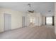 Carpeted main bedroom features a ceiling fan and ensuite bathroom access at 11519 Glenmont Dr, Tampa, FL 33635