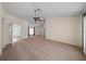 Large main bedroom boasts neutral carpet and connecting bathroom entrance at 11519 Glenmont Dr, Tampa, FL 33635