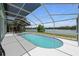 Enjoy the pool, waterfront view, and screened in patio area offering beautiful outdoor living and entertaining at 11519 Glenmont Dr, Tampa, FL 33635