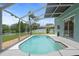 Relax in this screened-in pool and patio area, which is perfect for enjoying a relaxing outdoor experience at 11519 Glenmont Dr, Tampa, FL 33635