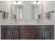Stylish bathroom featuring double sinks, sleek fixtures, and modern design at 1550 48Th N Ave, St Petersburg, FL 33703