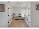 Bright and airy office space with a modern desk, natural light, and stylish decor at 1550 48Th N Ave, St Petersburg, FL 33703