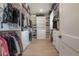 Spacious walk-in closet with custom shelving, drawers and ample storage space at 1550 48Th N Ave, St Petersburg, FL 33703