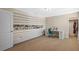 Spacious bedroom with custom shelving for shoe storage and an adjacent walk-in closet at 19309 Prairie Tree Pl, Tampa, FL 33647