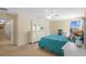 Inviting bedroom with a large window providing natural light, plus decorative furnishings at 19309 Prairie Tree Pl, Tampa, FL 33647