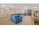 Upstairs loft featuring plush furniture and an abundance of natural light from a nearby window at 19309 Prairie Tree Pl, Tampa, FL 33647