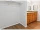Bathroom with double vanity, granite countertop, and tile floors at 200 Country Club Dr # 308, Largo, FL 33771