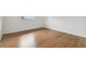 Bright bedroom with new hardwood floors and a window at 200 Country Club Dr # 308, Largo, FL 33771