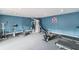 Well-equipped fitness center with treadmills, stationary bikes, and weightlifting machines for residents' convenience at 200 Country Club Dr # 308, Largo, FL 33771
