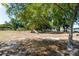 Community playground with swings, slides, and picnic tables near a lake at 22304 Stillwood Dr, Land O Lakes, FL 34639