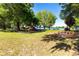 Neighborhood park with playground, picnic tables, and lake views at 22304 Stillwood Dr, Land O Lakes, FL 34639