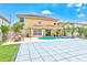 Beautiful backyard with pool, covered patio, and lush landscaping at 2300 Hannah S Way, Dunedin, FL 34698