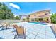 Backyard view featuring a pool, patio and lounge seating at 2300 Hannah S Way, Dunedin, FL 34698