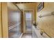 Bathroom featuring a glass door shower, storage cabinet, and convenient towel rack at 2300 Hannah S Way, Dunedin, FL 34698