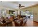 Bright living room offers outdoor views and comfortable seating for entertaining at 2300 Hannah S Way, Dunedin, FL 34698