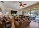 Spacious living room with outdoor views and comfortable seating for relaxing at 2300 Hannah S Way, Dunedin, FL 34698