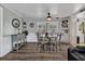 Cozy dining room featuring stylish decor, wood floors, and ample natural light at 2331 Belleair Rd # 214, Clearwater, FL 33764
